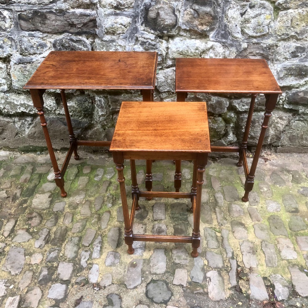 A late 19th century mahogany nest of three tables  View VI