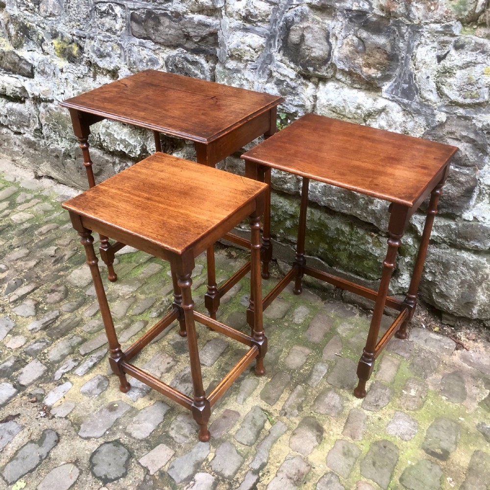 A late 19th century mahogany nest of three tables  View VII
