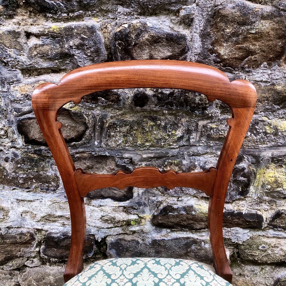 A set of six mid Victorian walnut dining chairs  View VI