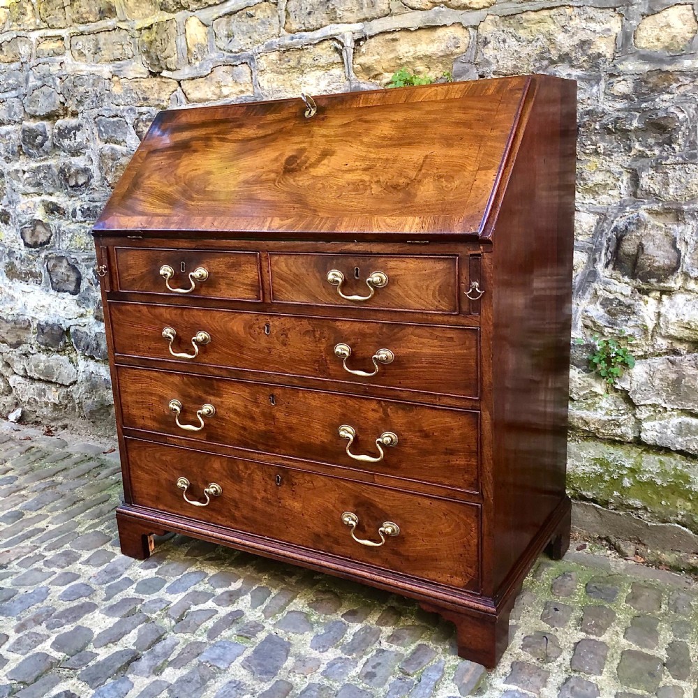 A fine George III mahogany fall-front bureau 