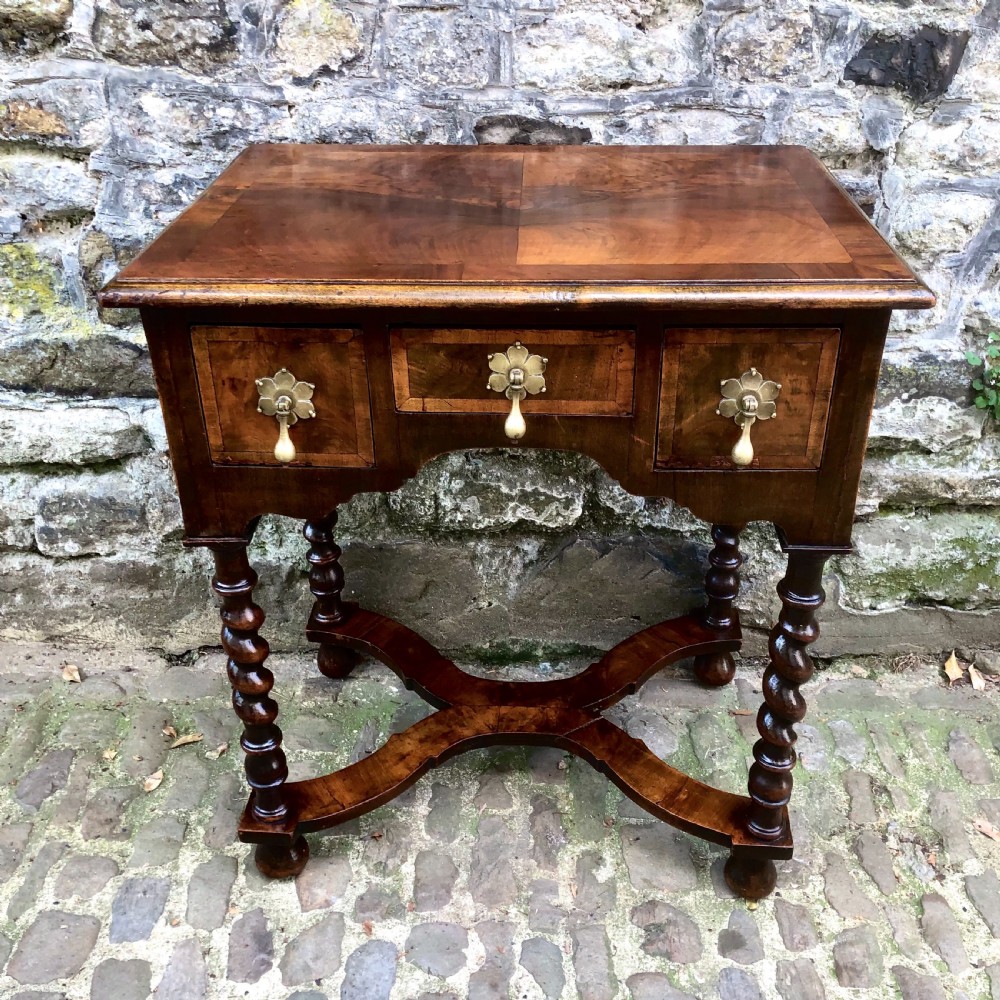 A late 19th century walnut lowboy in the late 17th century style
