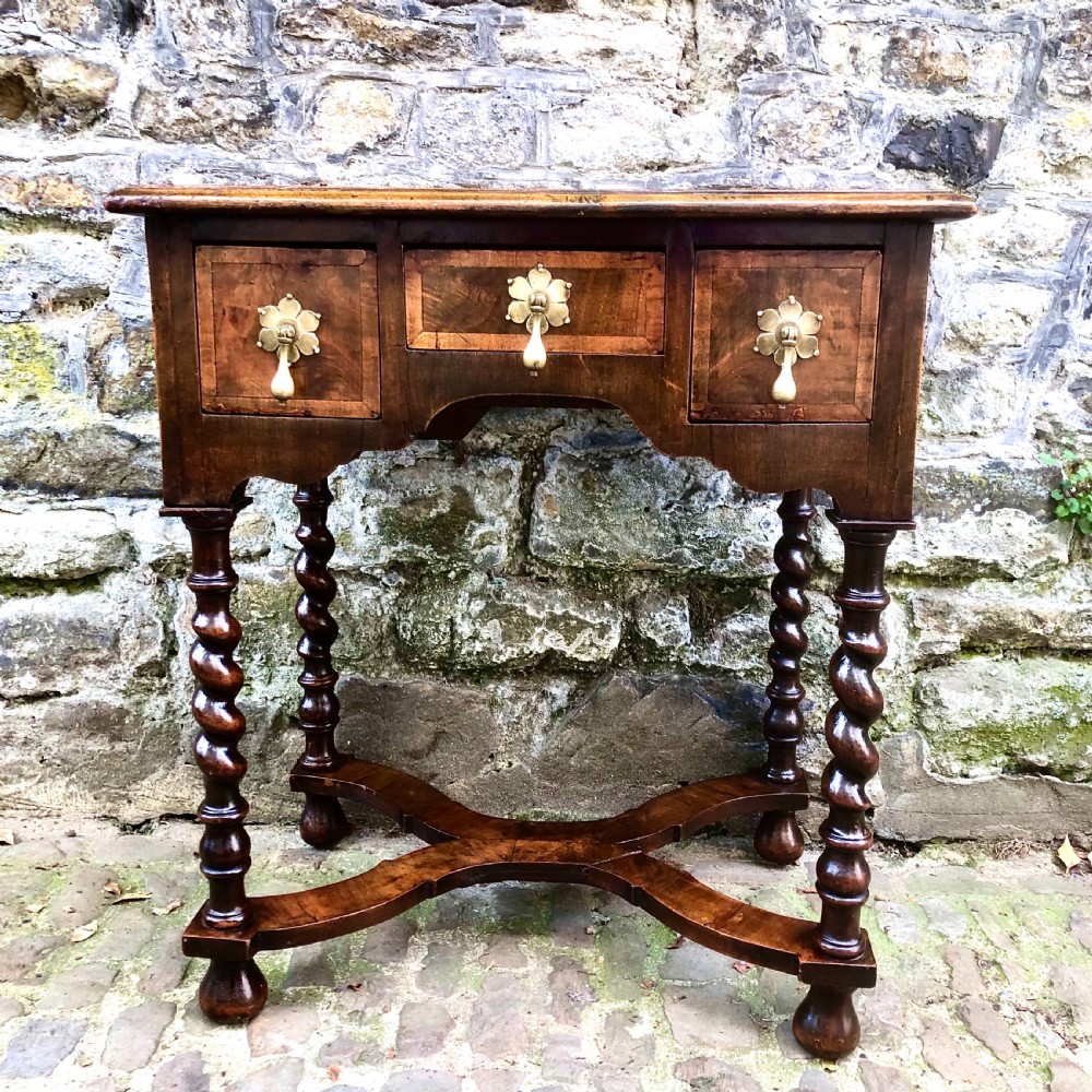 A late 19th century walnut lowboy in the late 17th century style View II