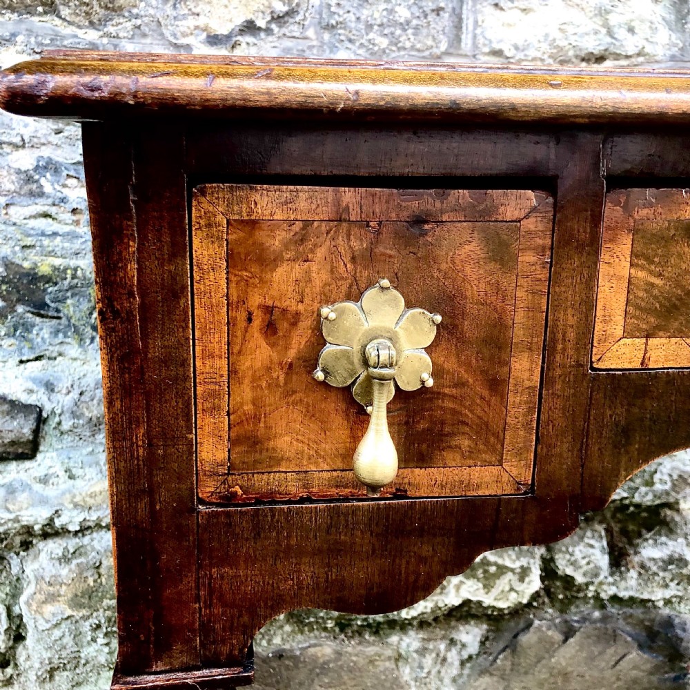 A late 19th century walnut lowboy in the late 17th century style View V