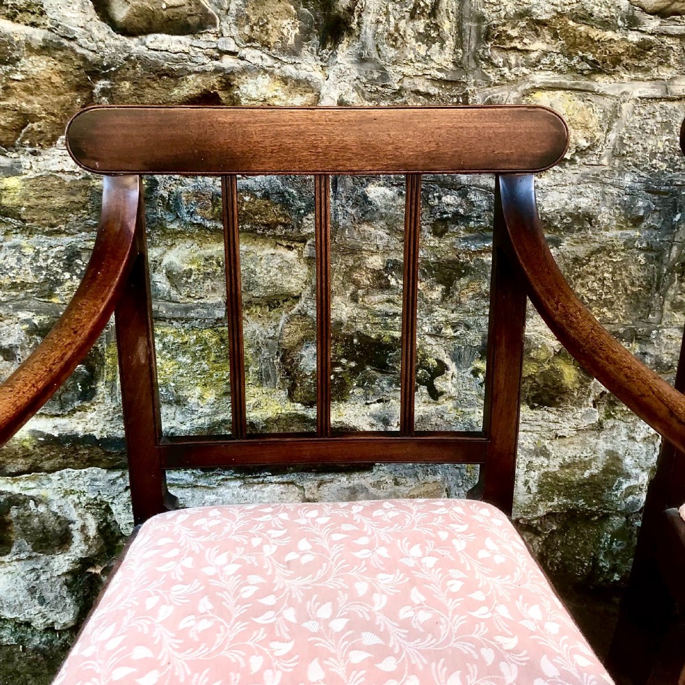 A set of six George III mahogany dining chairs  View X