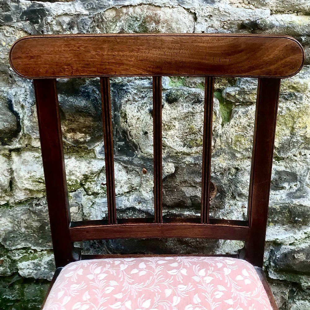 A set of six George III mahogany dining chairs  View XI
