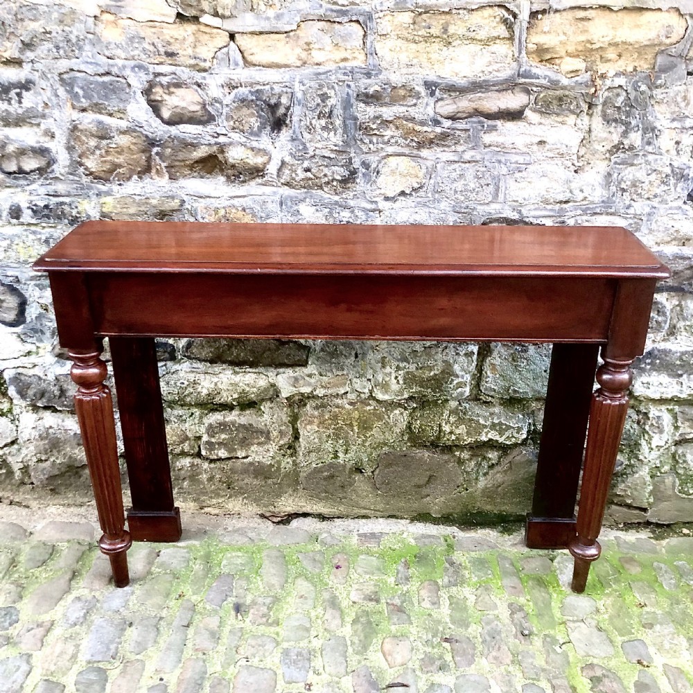 A pair of early Victorian mahogany console tables View V