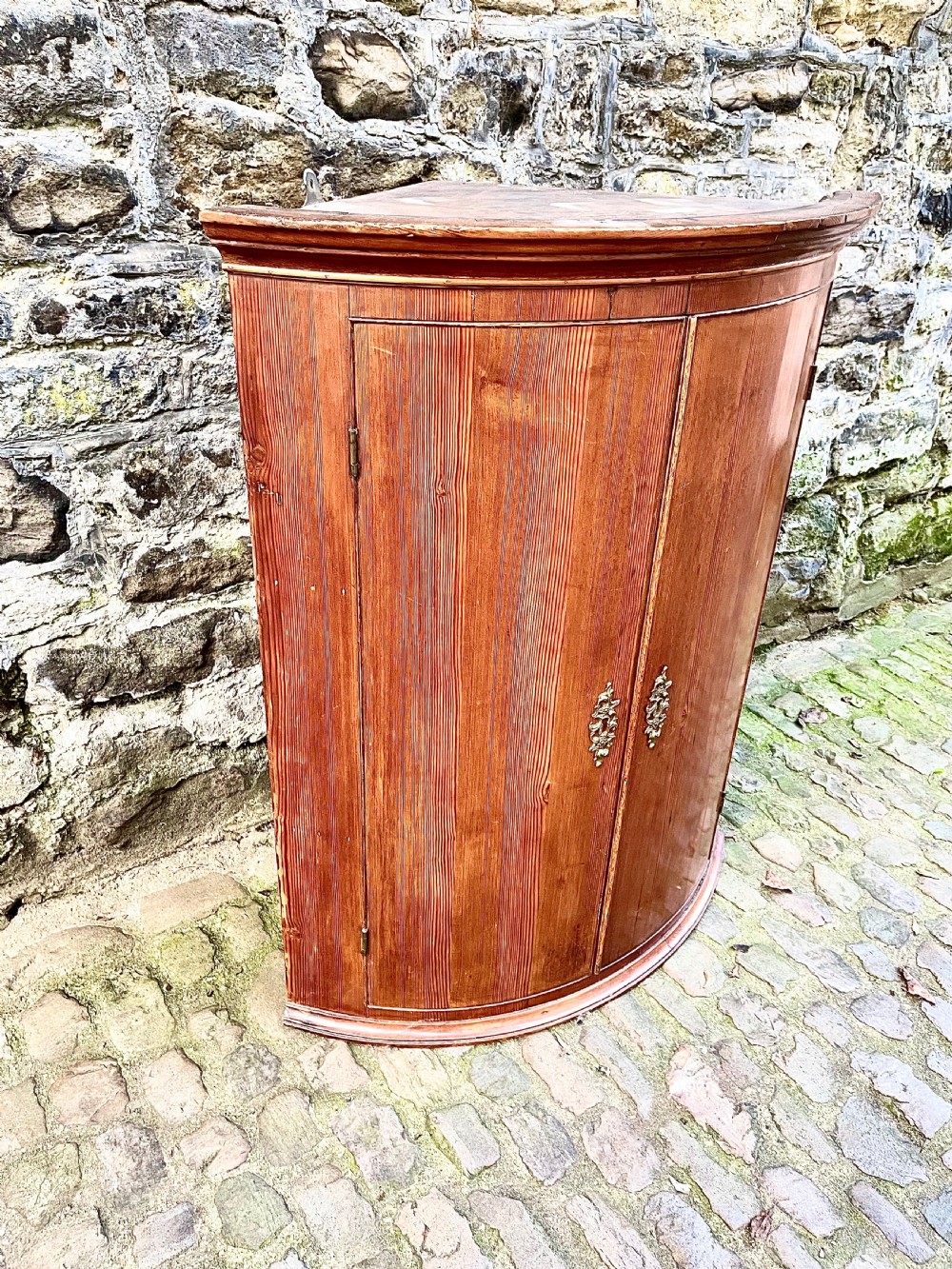 A George III pine bowfront corner cupboard  View III