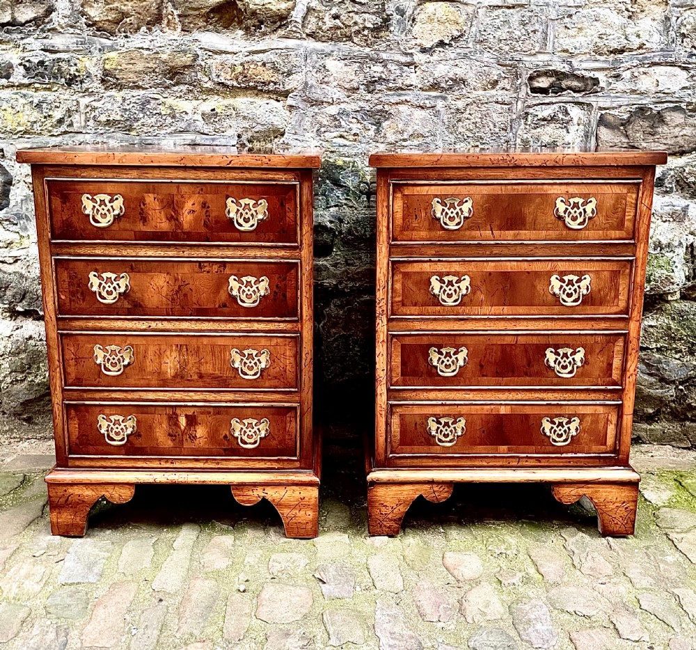 A pair of 20th century yew wood bedside tables 