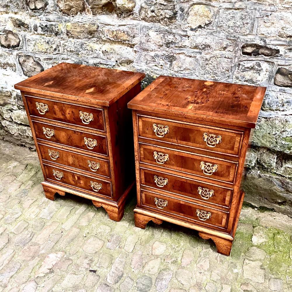 A pair of 20th century yew wood bedside tables  View II