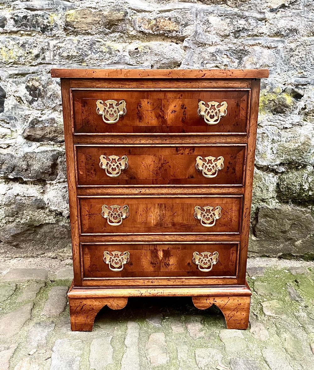 A pair of 20th century yew wood bedside tables  View V