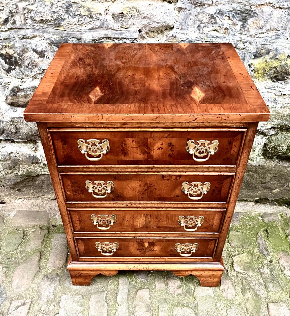 A pair of 20th century yew wood bedside tables  View VI