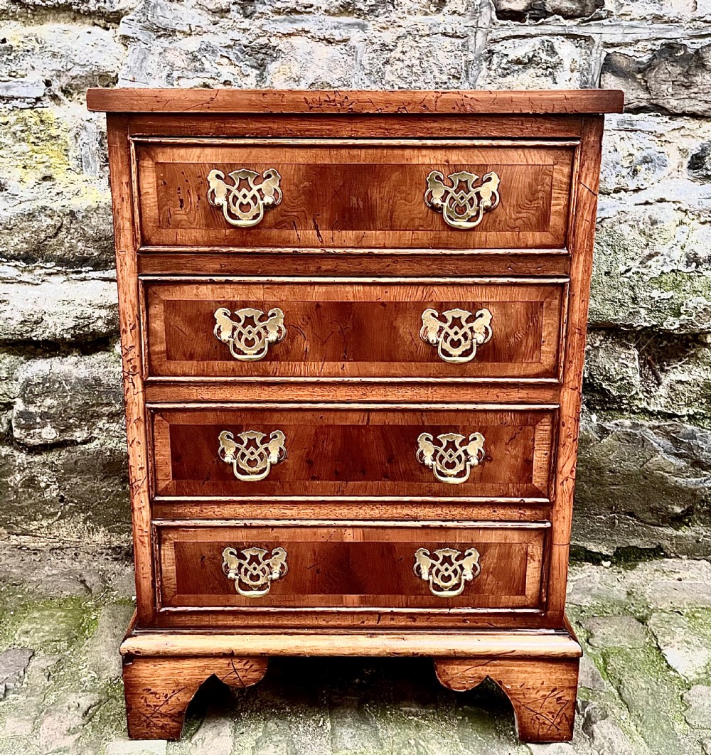 A pair of 20th century yew wood bedside tables  View VII