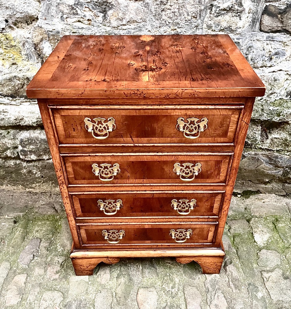 A pair of 20th century yew wood bedside tables  View VIII