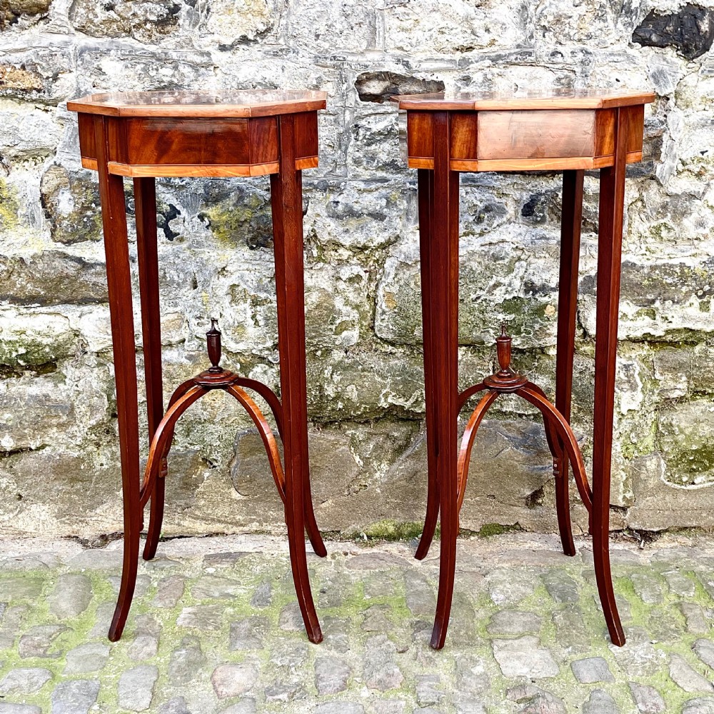A pair of late 19th century mahogany Sheraton Revival lampstands 