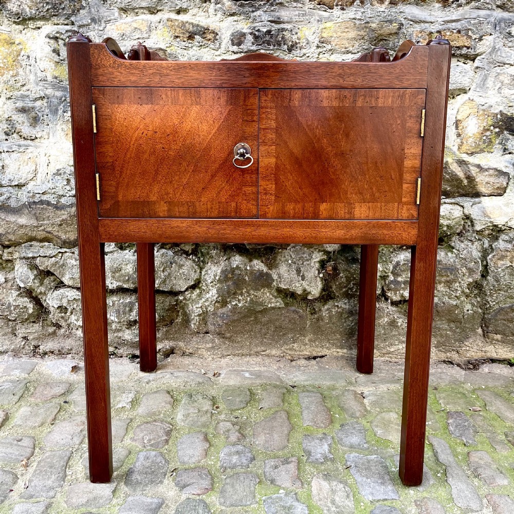 A pair of George III style mahogany bedside tables  View V
