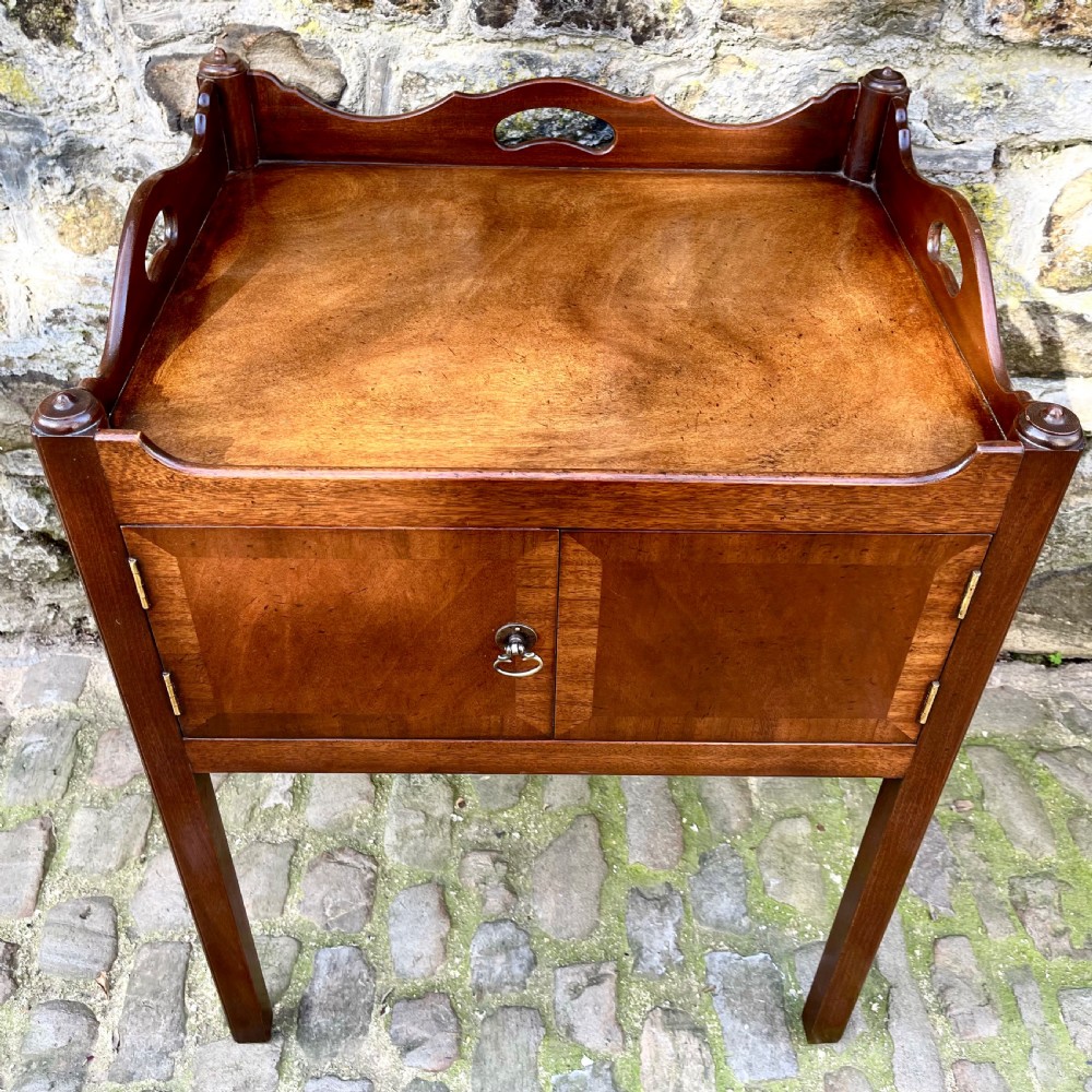 A pair of George III style mahogany bedside tables  View VI