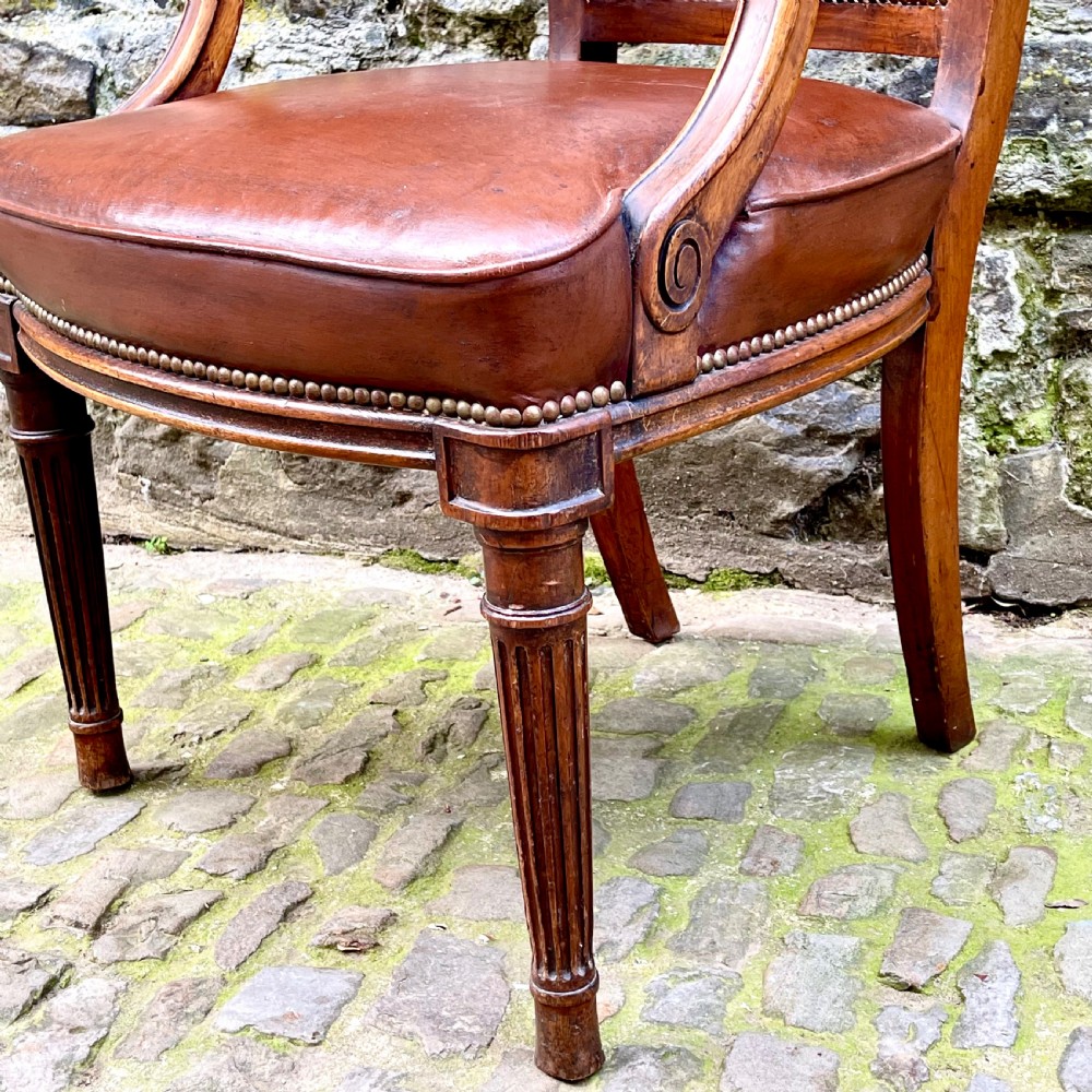 A mid Victorian mahogany desk chair View IV