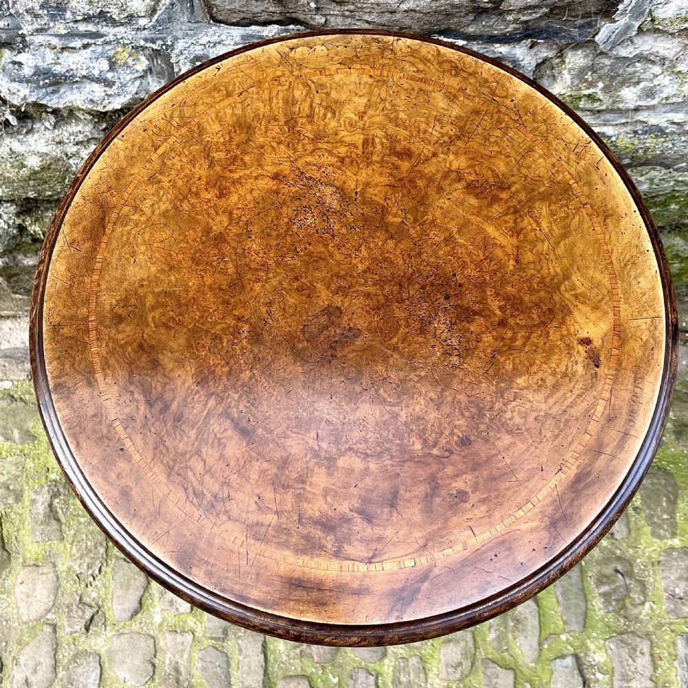 An unusual Victorian burr walnut and boxwood tripod wine table View II