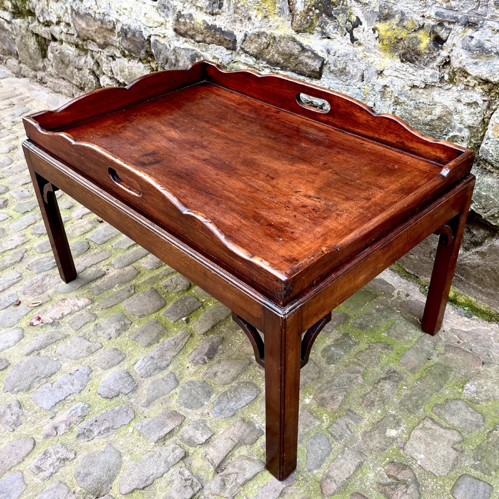 A late 19th century mahogany tray-top coffee table View II
