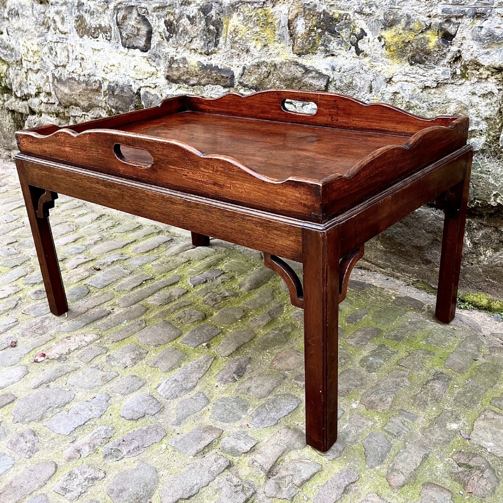 A late 19th century mahogany tray-top coffee table View IV
