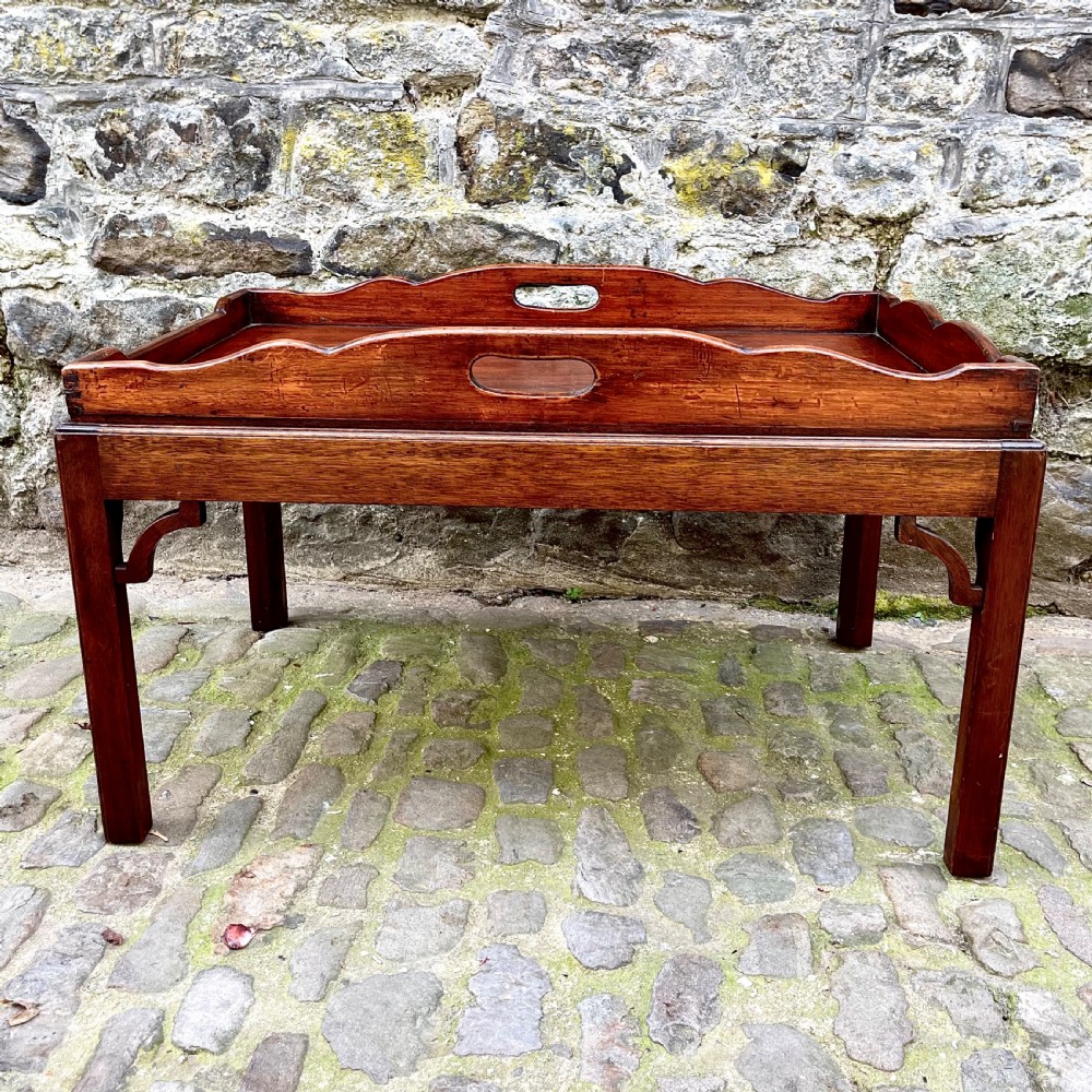 A late 19th century mahogany tray-top coffee table View V