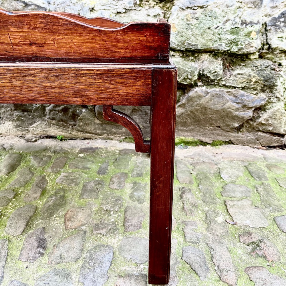 A late 19th century mahogany tray-top coffee table View VI