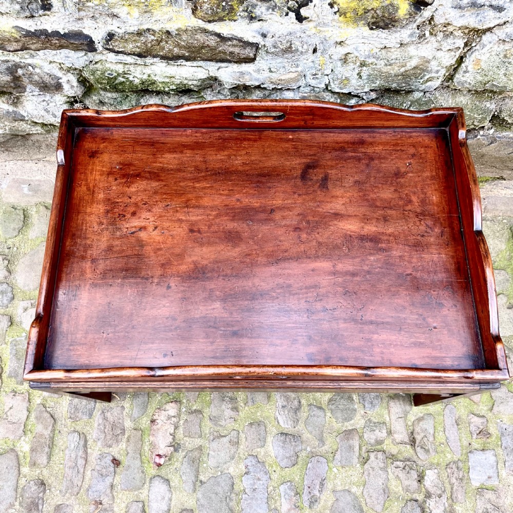 A late 19th century mahogany tray-top coffee table View VII