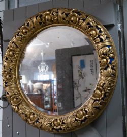 PRERAPHAELITE STYLE HAND CARVED LIME WOOD AND GILDED ROUND MIRROR
