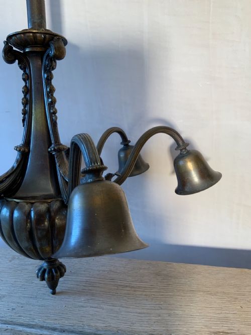 A PATINATED BRONZE CHANDELIER - ADDITIONAL PHOTO 1