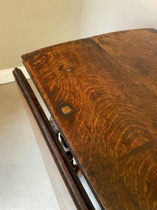 A LARGE 17TH CENTURY OAK GATE LEG DINING TABLE - ADDITIONAL PHOTO 1