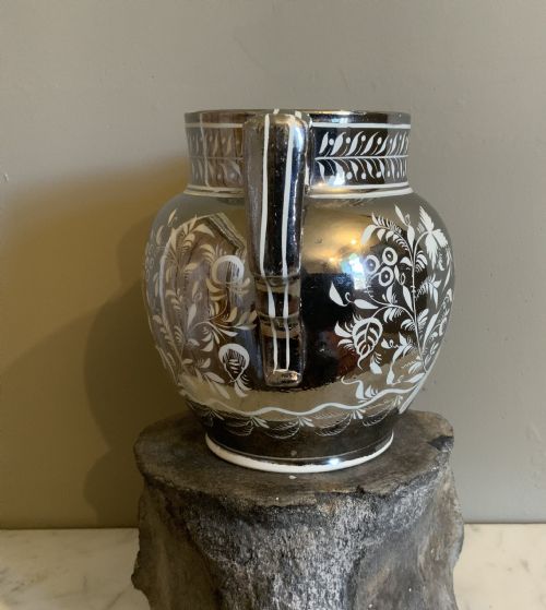 AN EARLY 19TH CENTURY SILVER RESIST POTTERY JUG - ADDITIONAL PHOTO 1