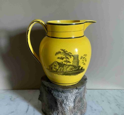 AN EARLY 19TH CENTURY CANARY YELLOW POTTERY JUG - ADDITIONAL PHOTO 1