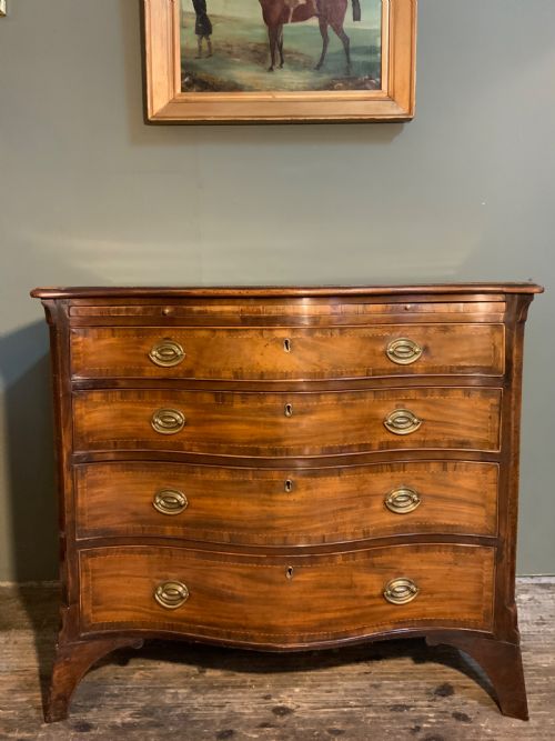 an 18th century mahogany serpentine chest - CATEGORY: ANTIQUE CHEST OF DRAWERS - DATED 18TH CENTURY