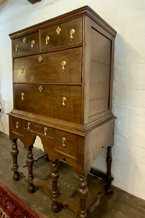A QUEEN ANNE PERIOD OAK CHEST ON STAND - ADDITIONAL PHOTO 3