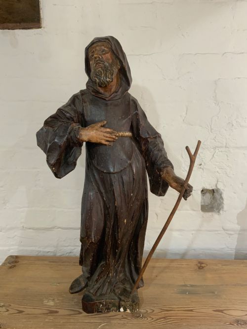 A Late 17th Century Carved and Polychrome Figure.