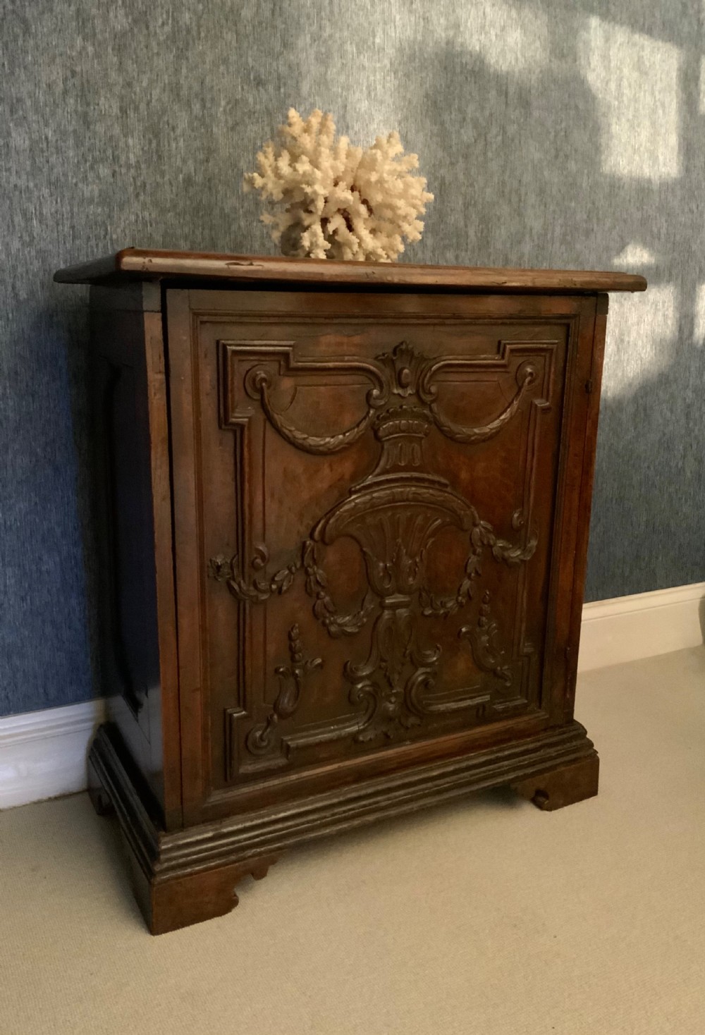A 17th century Italian walnut cabinet