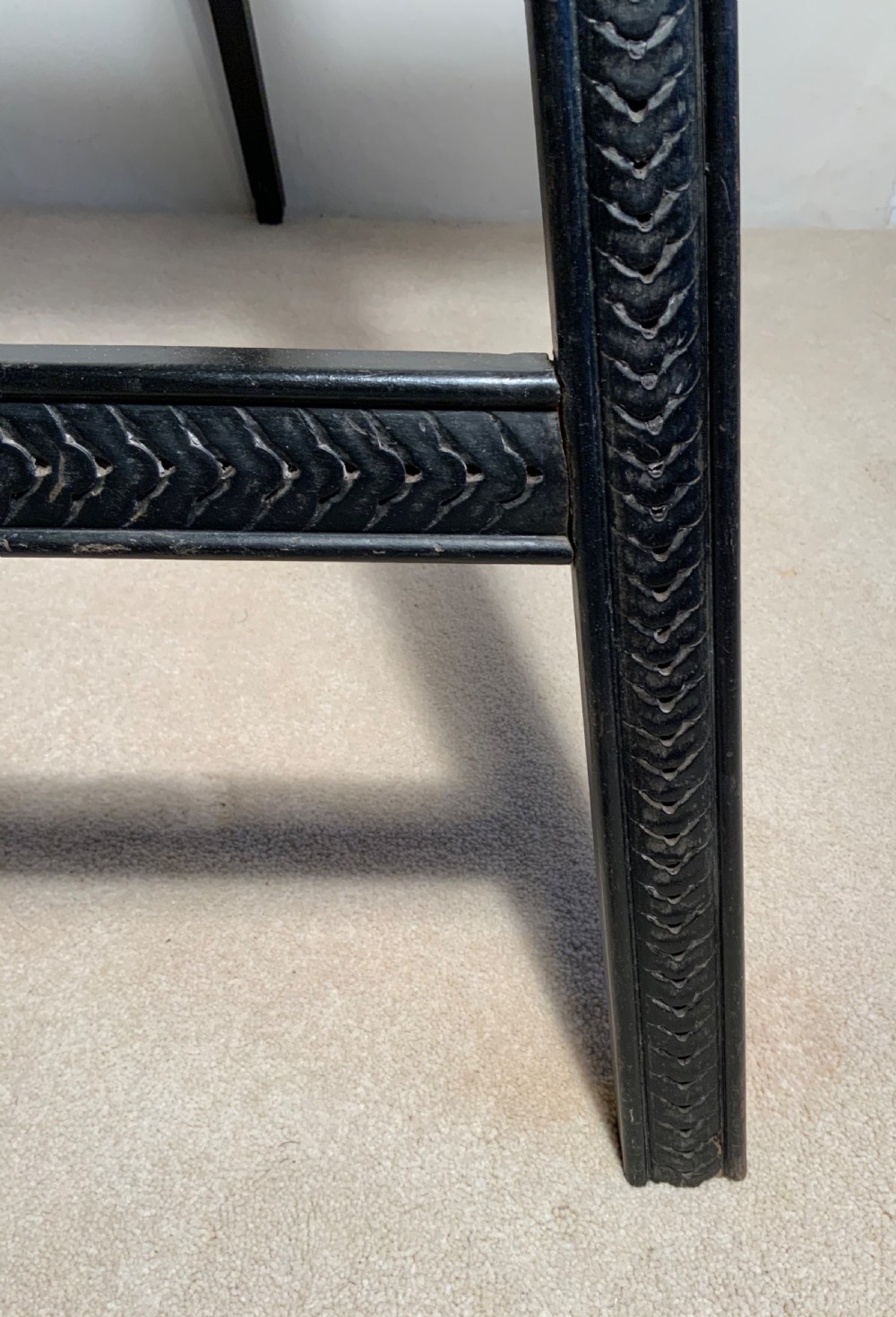 A Victorian ebonised easel View IV