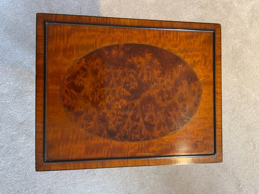 A quartetto, nest of mahogany tables View V