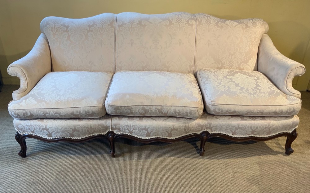 A late 19th century upholstered settee