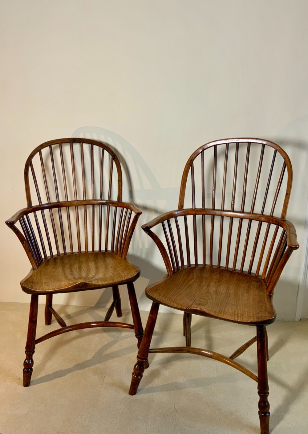 A pair of Thames Valley yew tree Windsor arm chairs