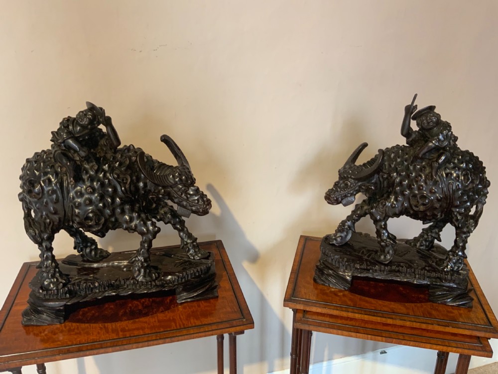A large pair of Chinese carved  wood water buffalo