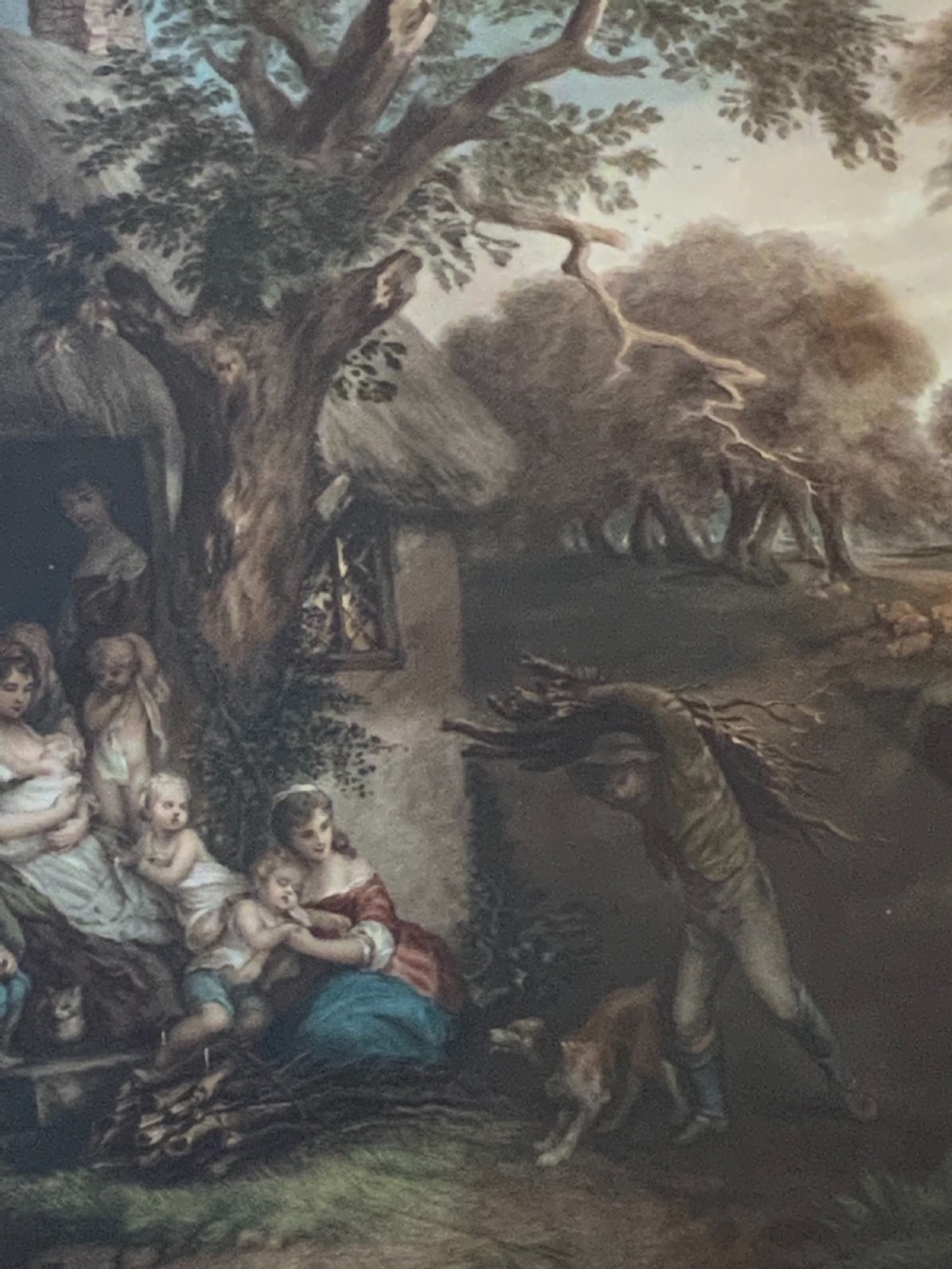 A pair of nineteenth-century mezzotint prints depicting pastoral landscape and cottage scenes, displayed in rectangular giltwood frames with gold slip mounts. View II