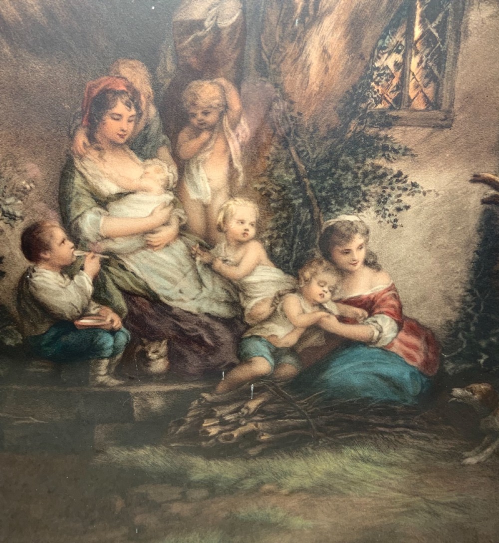 A pair of nineteenth-century mezzotint prints depicting pastoral landscape and cottage scenes, displayed in rectangular giltwood frames with gold slip mounts. View IV