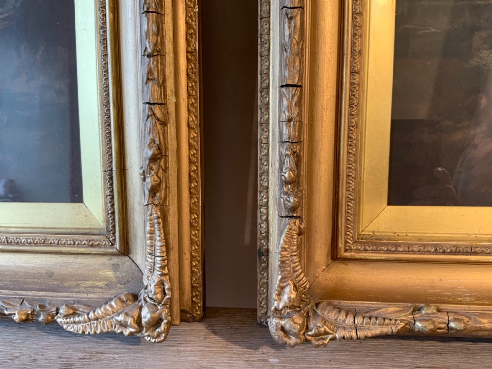 A pair of nineteenth-century mezzotint prints depicting pastoral landscape and cottage scenes, displayed in rectangular giltwood frames with gold slip mounts. View XII