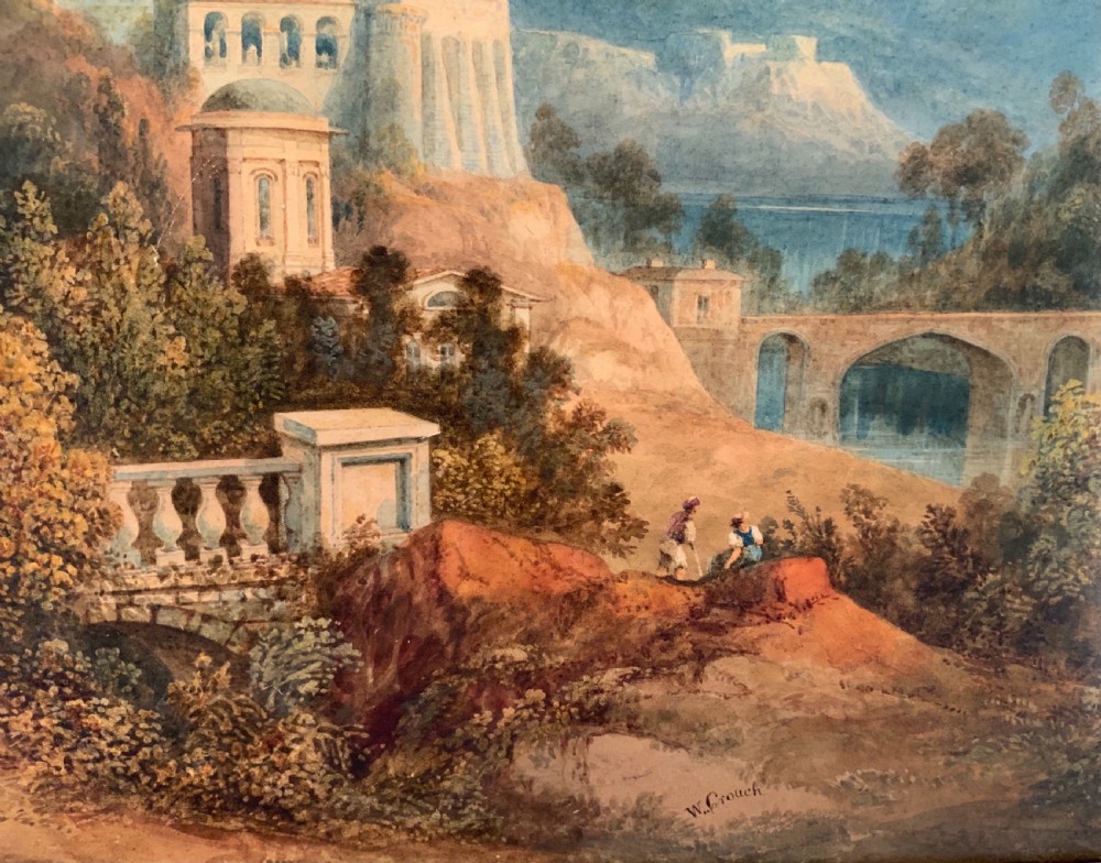 An antique 19th-century watercolour landscape by William Crouch depicting classical ruins, a bridge, and mountains, housed within a pink mount and an ornate gilt frame. View III