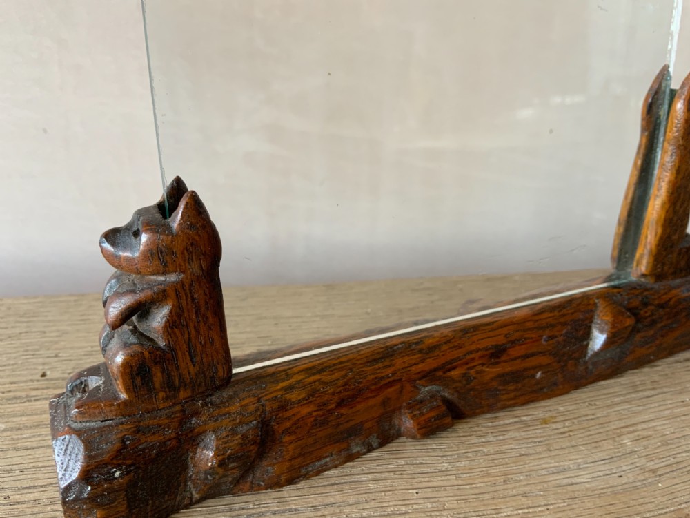 A  pair of carved oak photograph frames View IV