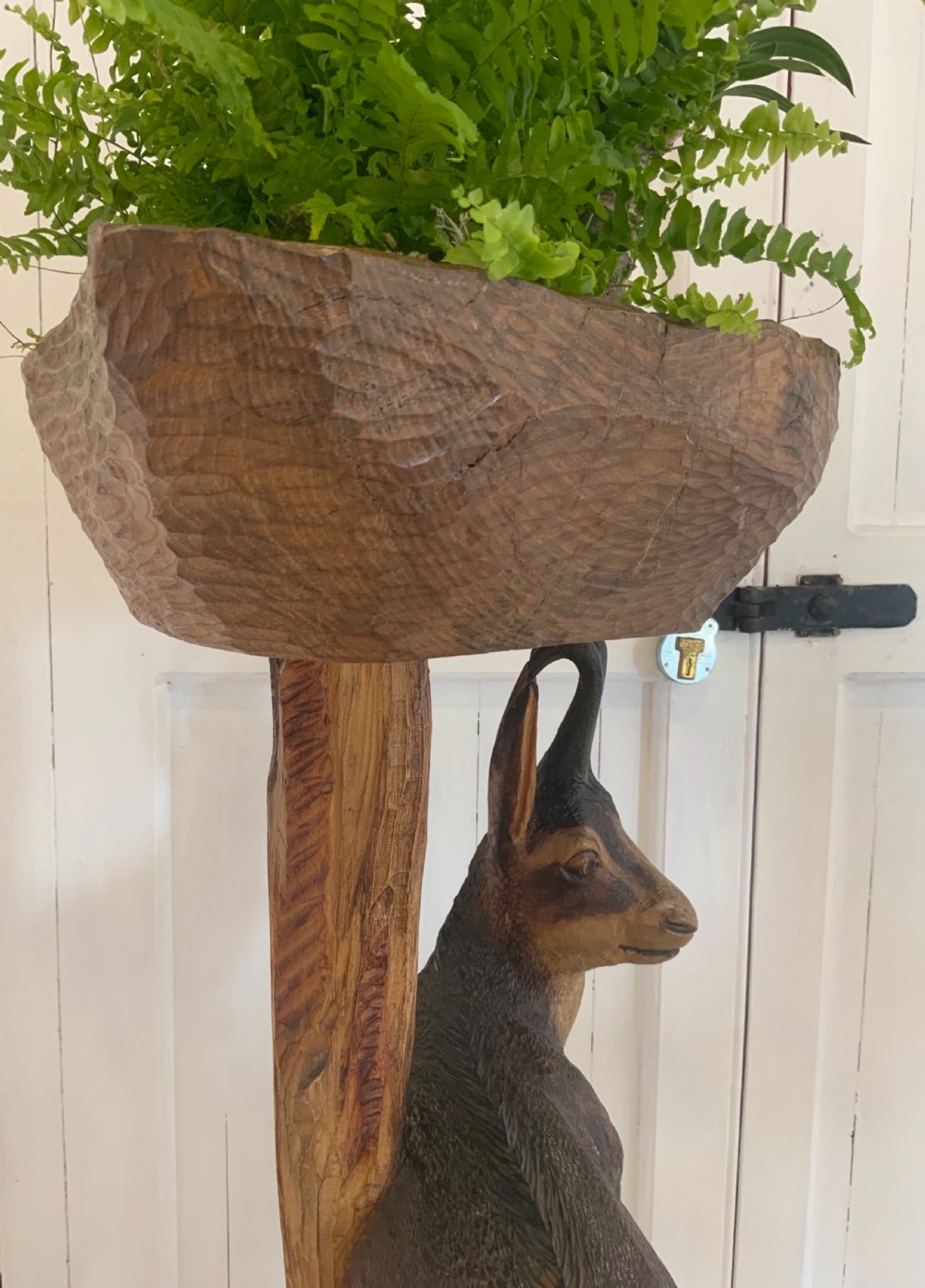 An early 20th century linden wood carved stand View VIII