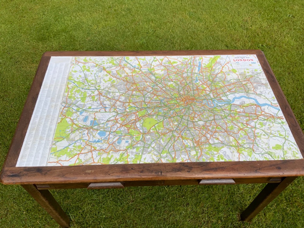 An oak two drawer writing table View IV