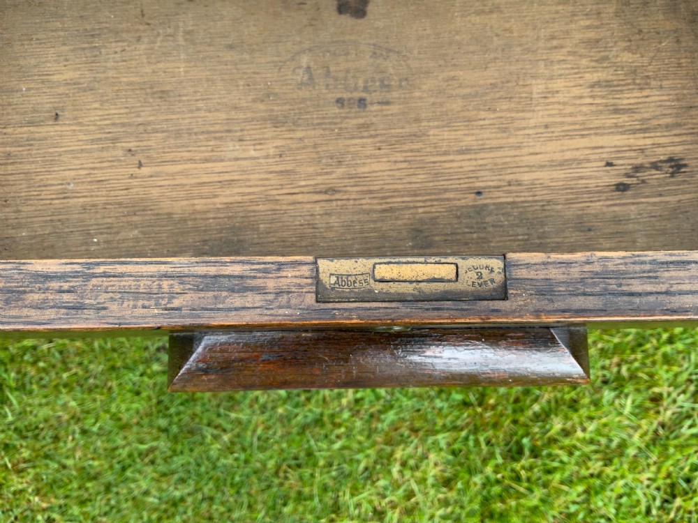 An oak two drawer writing table View VI