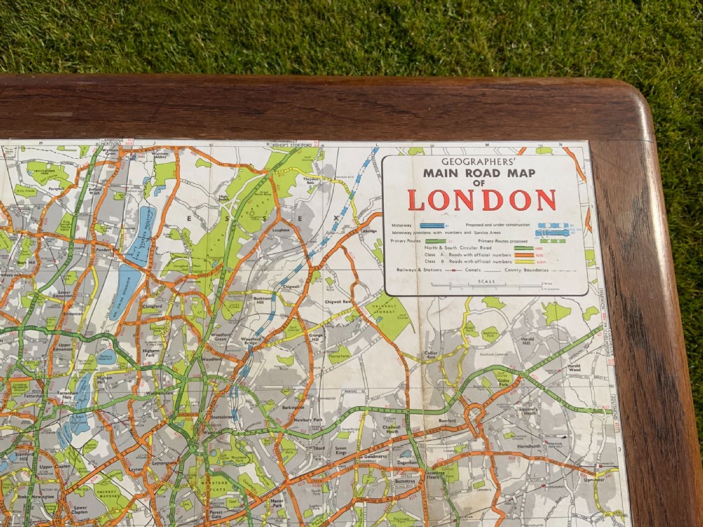 An oak two drawer writing table View IX